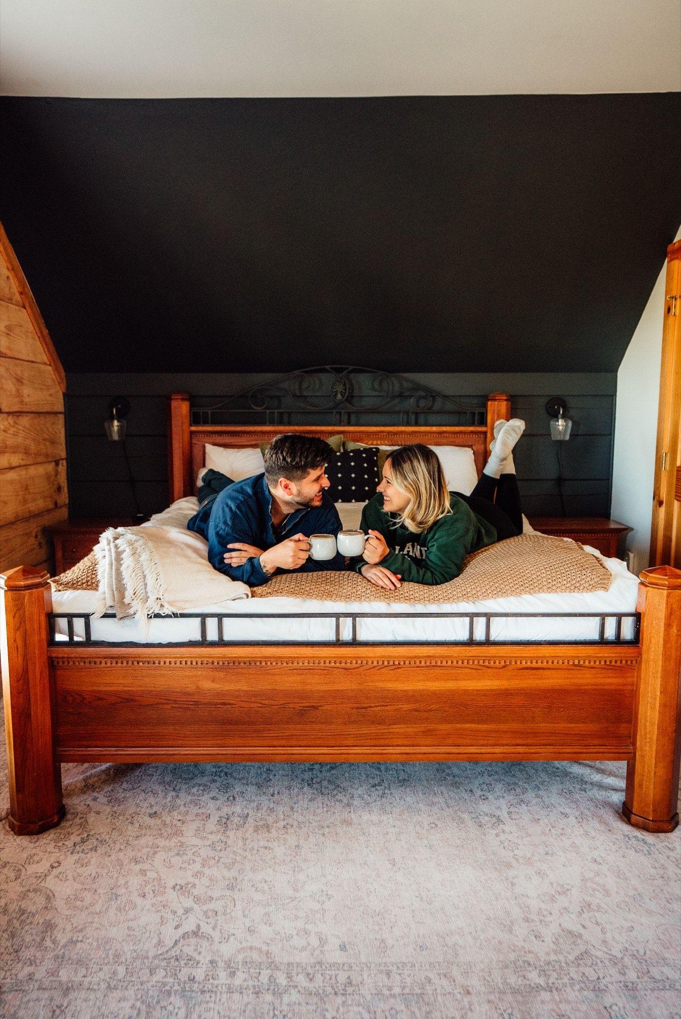 A slow morning with two mugs on the bed at a Wander Luxe home