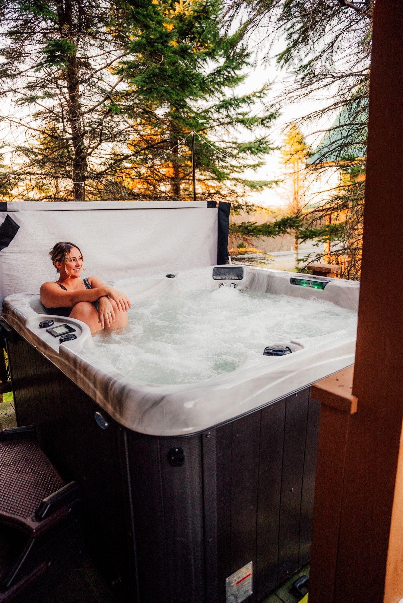 A private hot tub under fall color at the Timbers