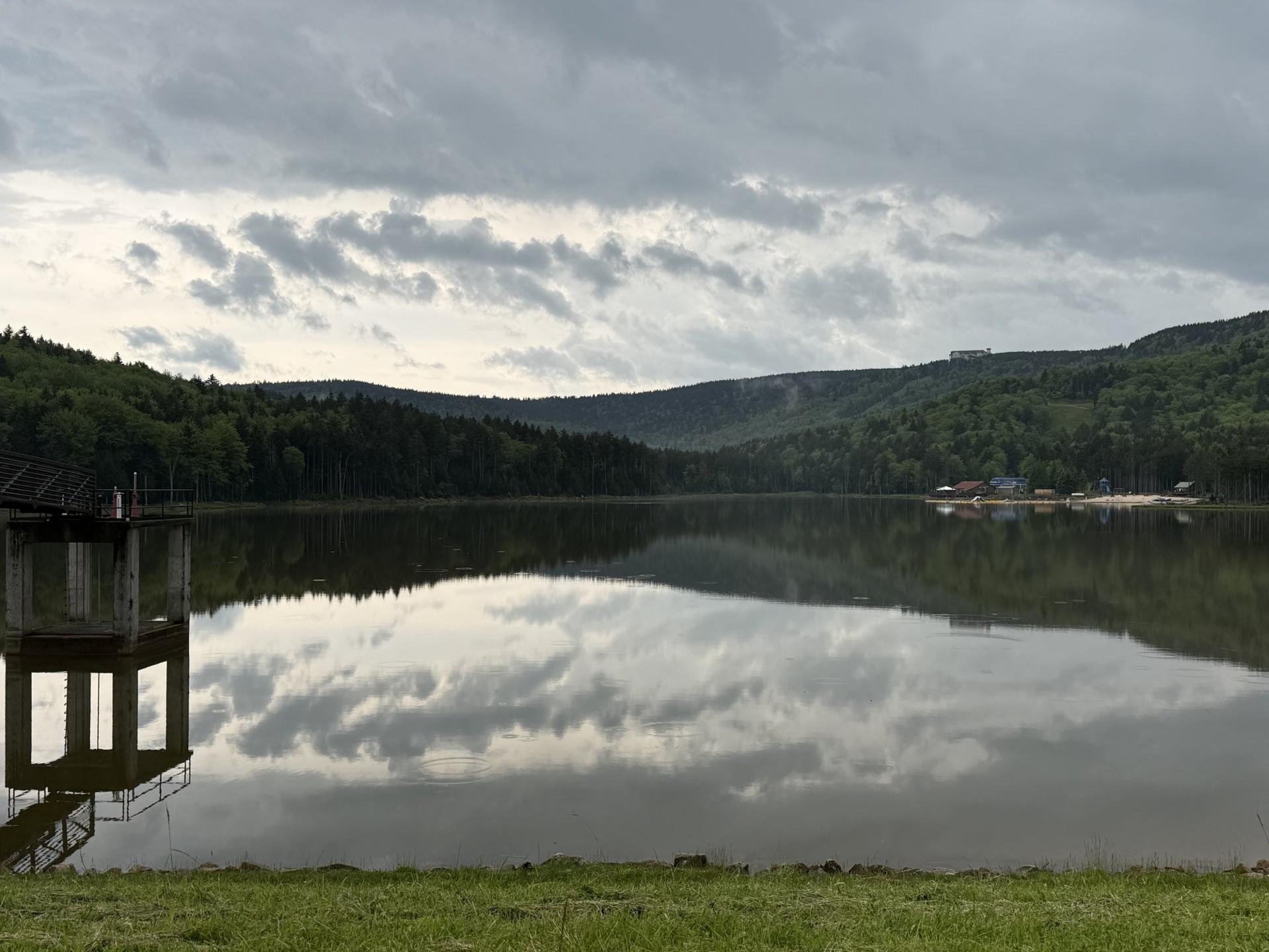 Shavers Lake dead still, clouds reflected in the water
