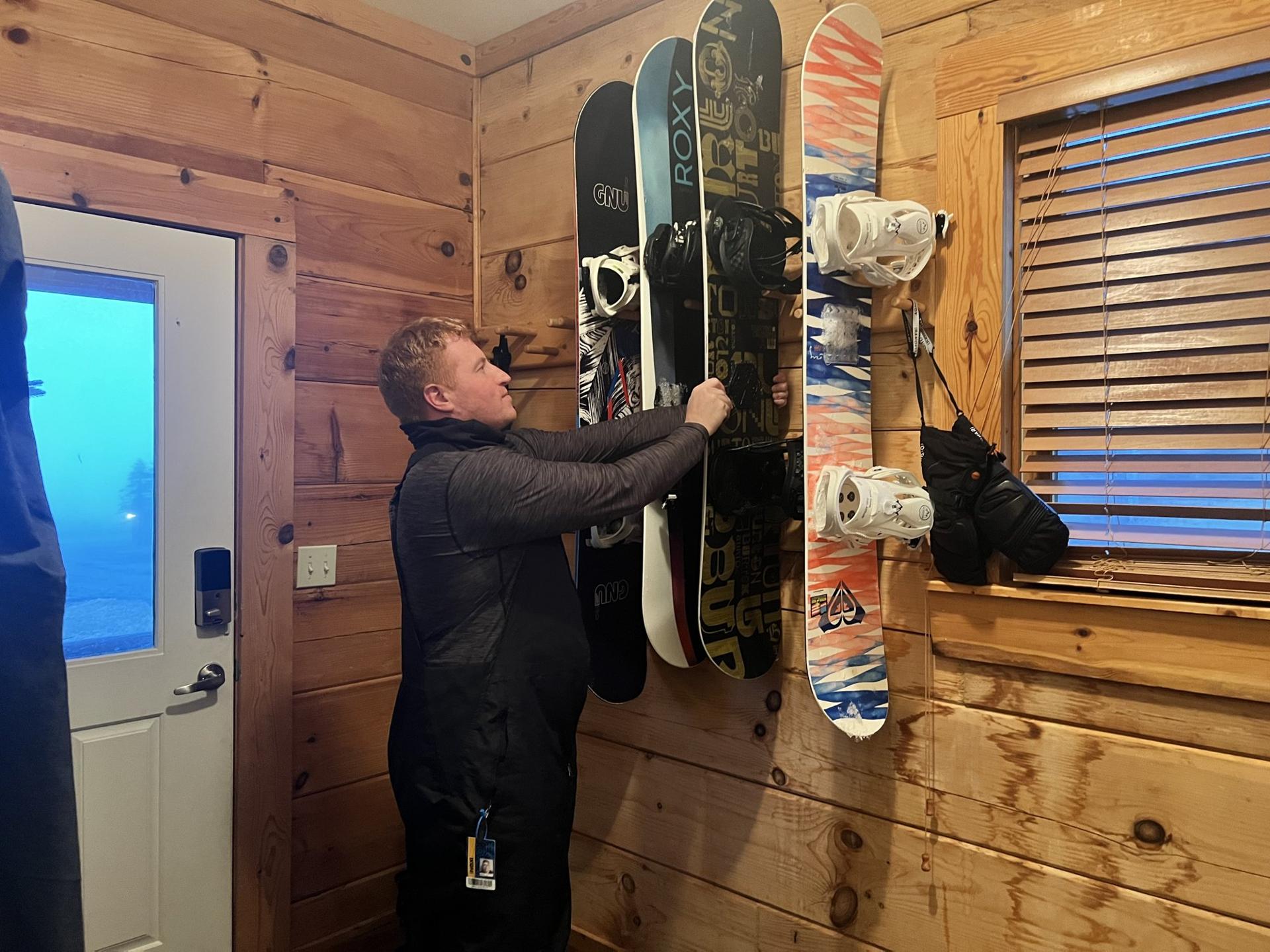 Boards on the rack in the mudroom